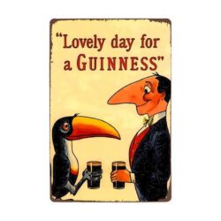 placa de metal vintage guinness tucan y hombre