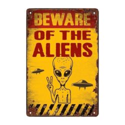 placa alienigena de metal