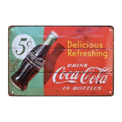 anuncio de coca cola en placa metalica
